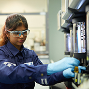 Worker in a lab at a Chevron Oronite Singapore Manufacturing Plant (SMP).